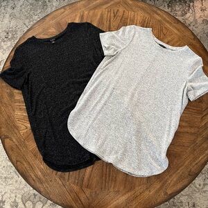 Set of 2 Ann Taylor curved hem tops. One gray heather and one black heather